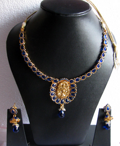 Gold finished necklace with earrings